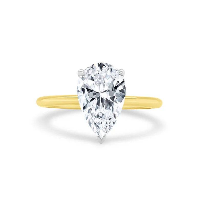 handcrafted rings for women -Pear Cut Solitaire