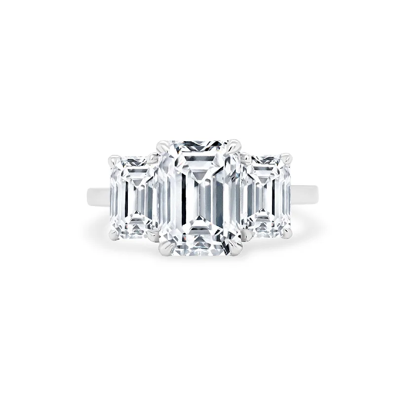 best luxury rings for women -Triple Emerald Cut