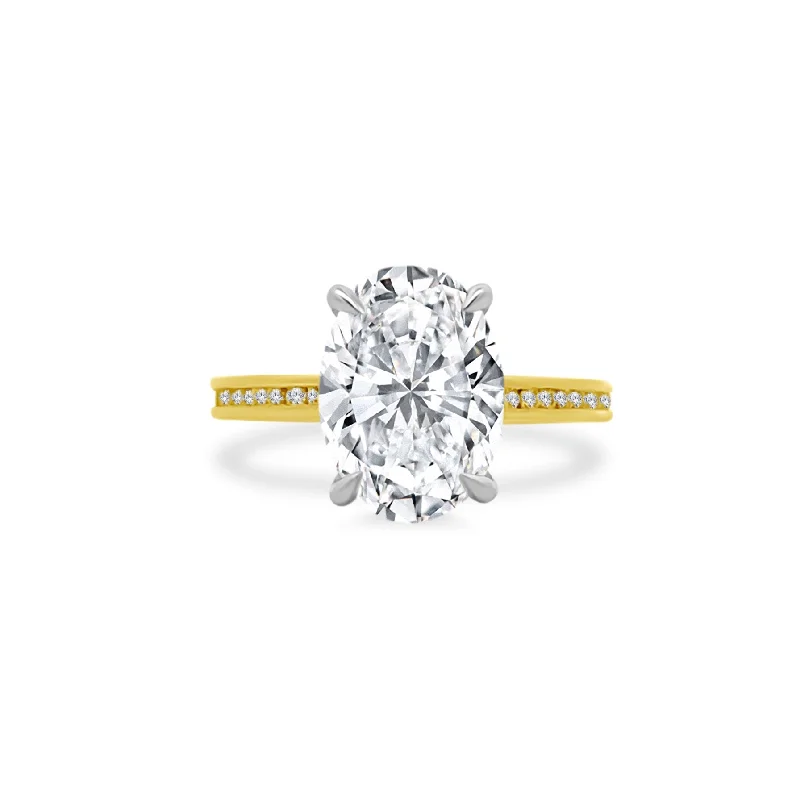 high fashion rings for women -Oval Cut Solitaire on Channel Set Diamond Band