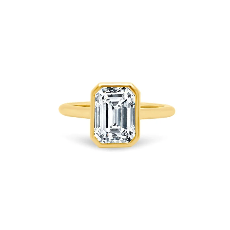 celestial rings for women -North South Bezel Set Emerald Cut Solitaire